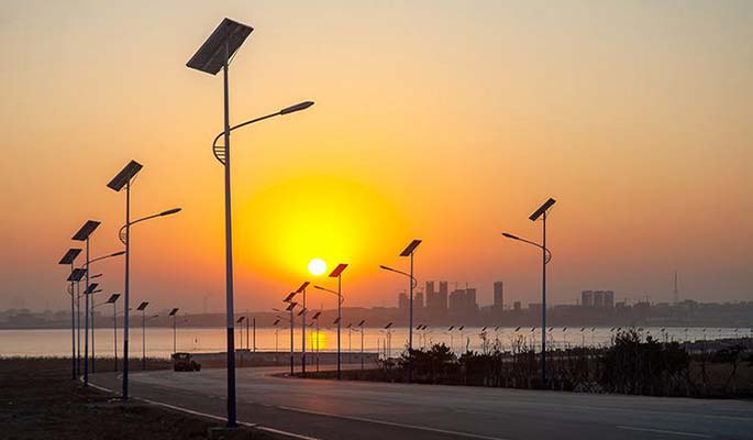 Solar street lights on the road by the sea