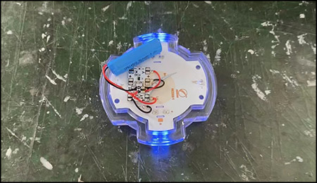 What is the role of photoresistors in solar road studs?